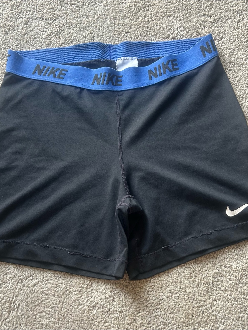 Nike Women's Black Bike Shorts with Blue Branded Waistband